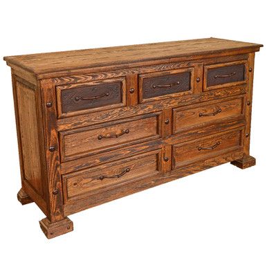 an old wooden dresser with many drawers