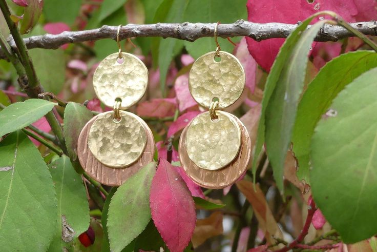 These handmade earrings are made of copper and brass. The earring hooks are made of brass plated stainless steel. Beautiful large earrings great for gifts! Round Dangle Earrings, Earrings Round, Hammered Metal, Copper And Brass, Handmade Copper, Earring Hooks, Large Earrings, Metal Earrings, Brass Earrings