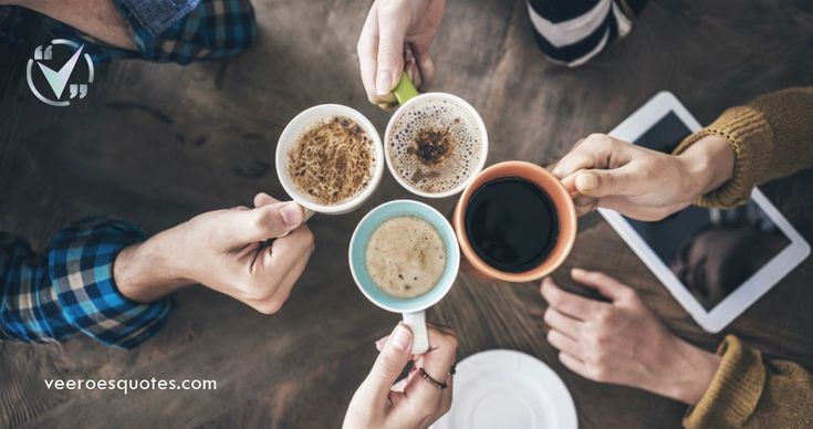 four people are holding coffee cups in their hands