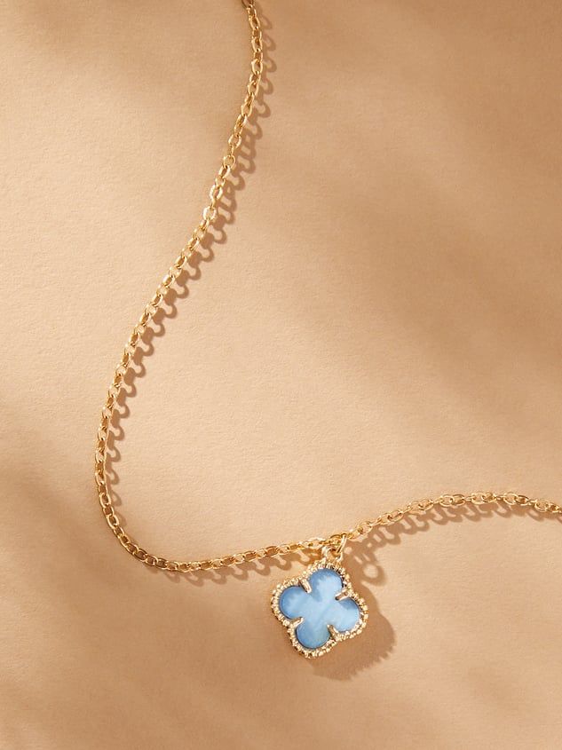 Simplicity in design but elegant in its statement, this 14K gold clover charm necklace is timeless in your jewelry box. Featuring a light blue clover charm outlined in gold and displayed on a dainty gold chain, this necklace creates an aura of beauty radiating from within and encapsulating its wearer. Trendy Teen Jewelry, Altered State Jewelry, Light Blue And Gold Necklace, Cute Blue Accessories, Gold And Blue Necklace, Cute Gold Necklaces, Gold Everyday Jewelry, Blue Bead Necklace, Cute Blue Things