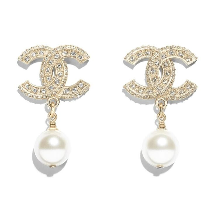 Chanel Rev Gold Resin Crystal Pearl White Cc Logo Statement Stud Drop Earrings ********** Chanel ********** Brand: Chanel Size: (1.5 Long X 0.75 Wide) Name: Crystal Color: Gold, Pearly White & Crystal Style: Stud Earrings Season: Rev Style#: A86506 Y09902 Z2953 Material: Metal Screw Back, Pierced Gold Metal Material Cc Crystal Stud Earrings With Pearl Drops Crystal Details Sold Out Worldwide, Runway, Extremely Rare Brand New In Box, With Tags And Dust Bag, Full Set 100% Authentic Or Your Money B Chanel Pearl Earrings, Earrings Chanel, Crystal Pearl Earrings, Chanel Pearls, Luxury Earrings, Chanel Earrings, Chanel Accessories, Chanel Jewelry, Crystal Stud Earrings