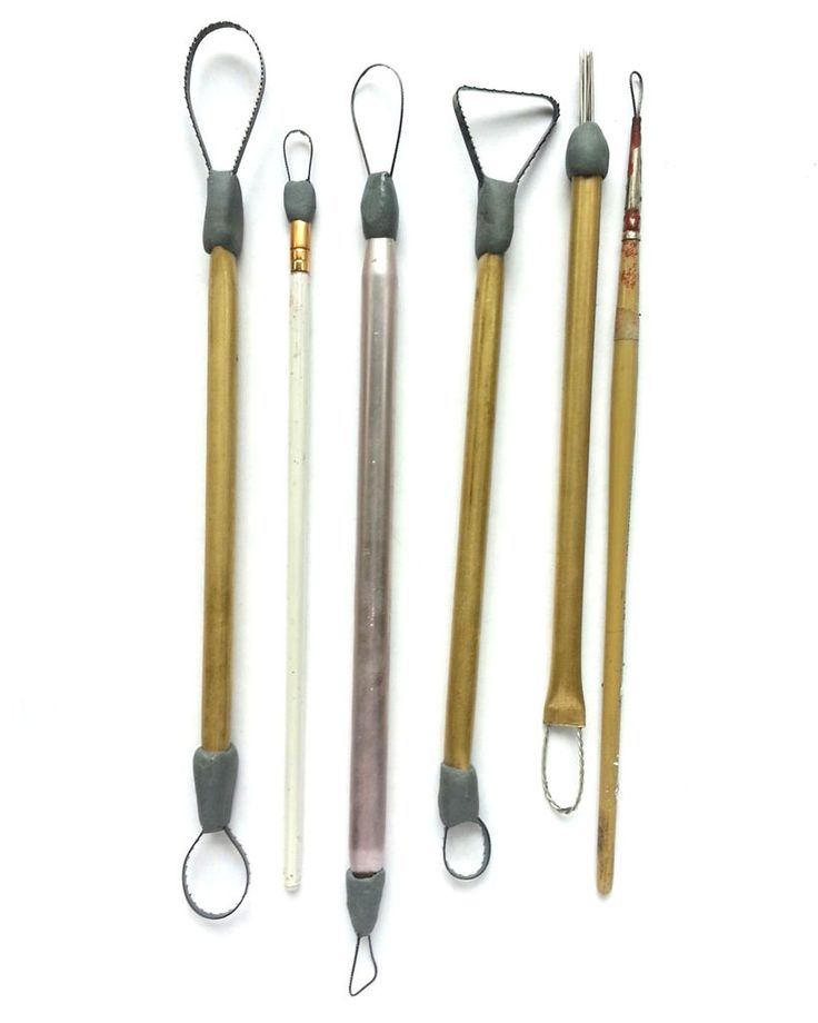 four different types of tools on a white surface