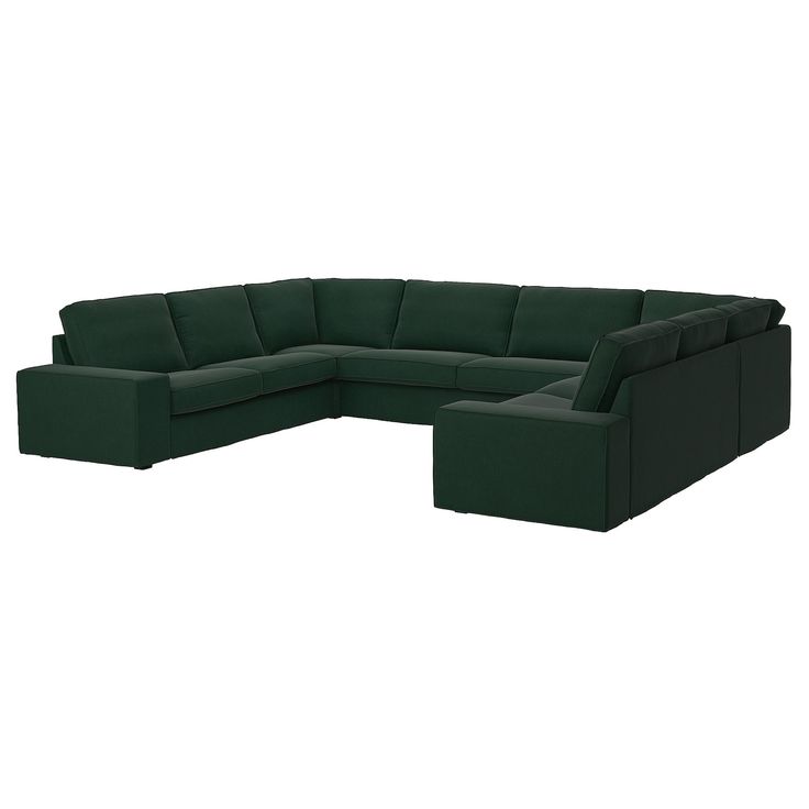 a black sectional sofa with ottoman and footstool in front of a white background