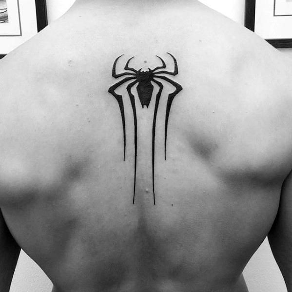 a man with a spider - man tattoo on his back