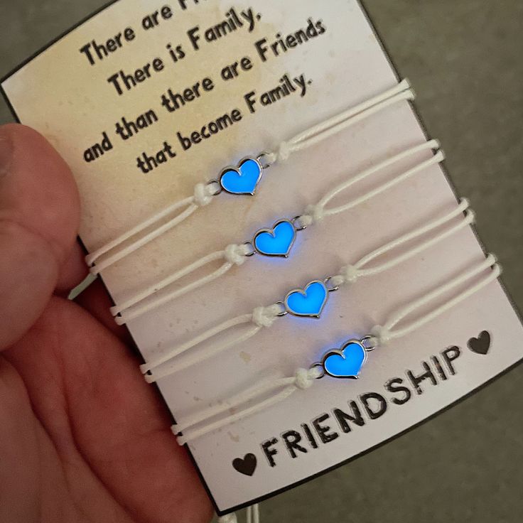 Set of 4 Friendship bracelet set which glow in the dark. If you look for a really unique gift idea for your best friends you found the one. The bracelets are fully adjustable with white leather string and heart charm in the middle. You can personalize the display card with your own message. Delivery 🚚  - 1st class Royal Mail delivery It takes 1-2 working days - Royal Mail International delivery It takes 5-7 working days to arrive Please note i need 1-2 working days to process your order. 💌 If Trendy Luminous Jewelry For Gifts, Valentine's Day Luminous Jewelry Gift, Luminous Jewelry For Valentine's Day Gift, Personalized Blue Friendship Bracelets For Best Friend, Hypoallergenic White Friendship Bracelets As Gift, Trendy White Friendship Bracelets For Best Friend, Luminous Adjustable Bracelets As Gifts, White Casual Friendship Bracelets For Valentine's Day, Casual White Friendship Bracelets For Valentine's Day