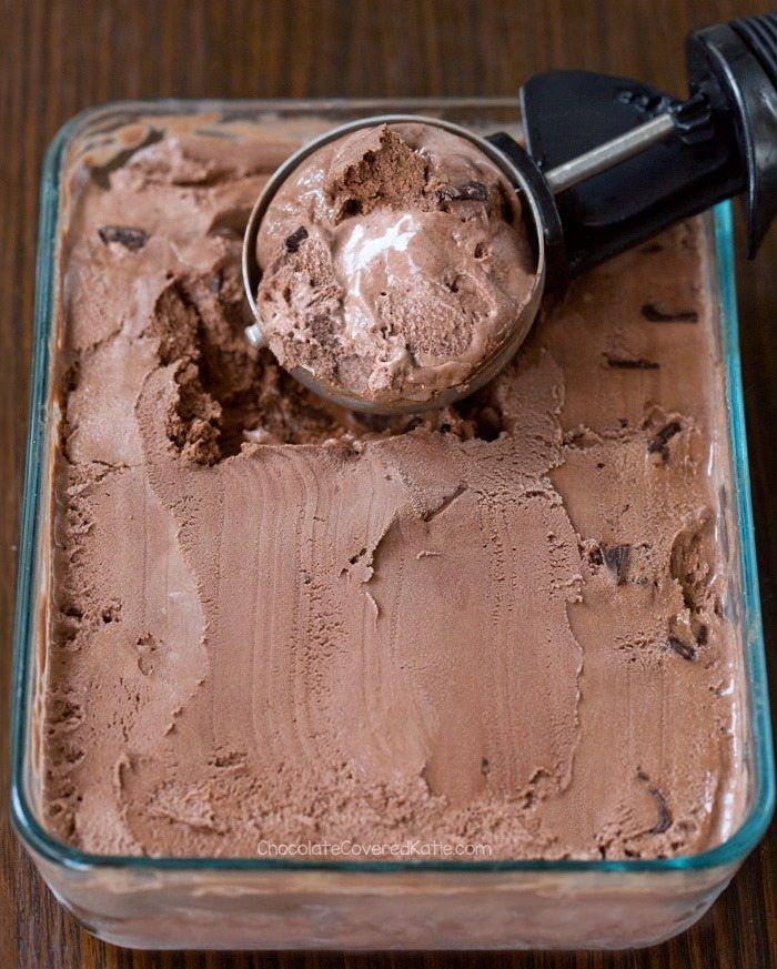 a scoop of ice cream in a glass dish