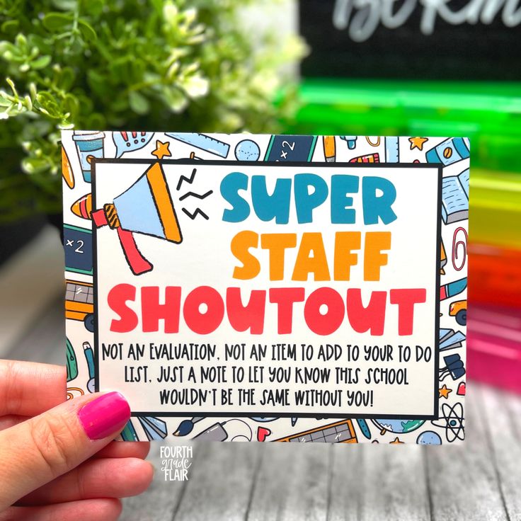 a hand holding up a card with the words super staff shotovt on it