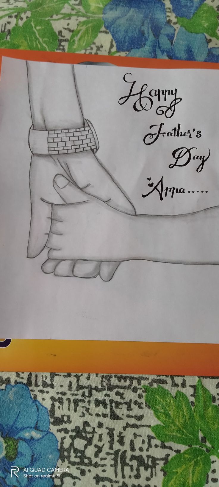 a drawing of two hands holding each other with the words happy father's day on it