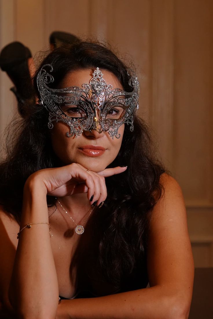 Step into the world of upscale glamour with our exquisite women's silver metal masquerade mask. The mask's silver shimmer adds an air of elegance, reflecting the light and adding a touch of enchantment to your appearance.

Age Group/Gender - Adult/Unisex

Size/Type - One size fits all adults

Mask Color - Silver

Shimmer Color - Silver

Mask Material - Lasercut Metal

Special Features - Rhinestones Masquerade Ball Outfit Ideas, Ball Outfit Ideas, Masquerade Ball Outfit, Silver Masquerade Mask, Masquerade Mask Women, Silver Mask, Metal Mask, Prom Inspo, Mask Masquerade