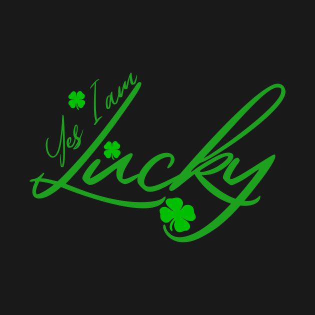 the word luck written in green ink on a black background with shamrock leaves and clovers