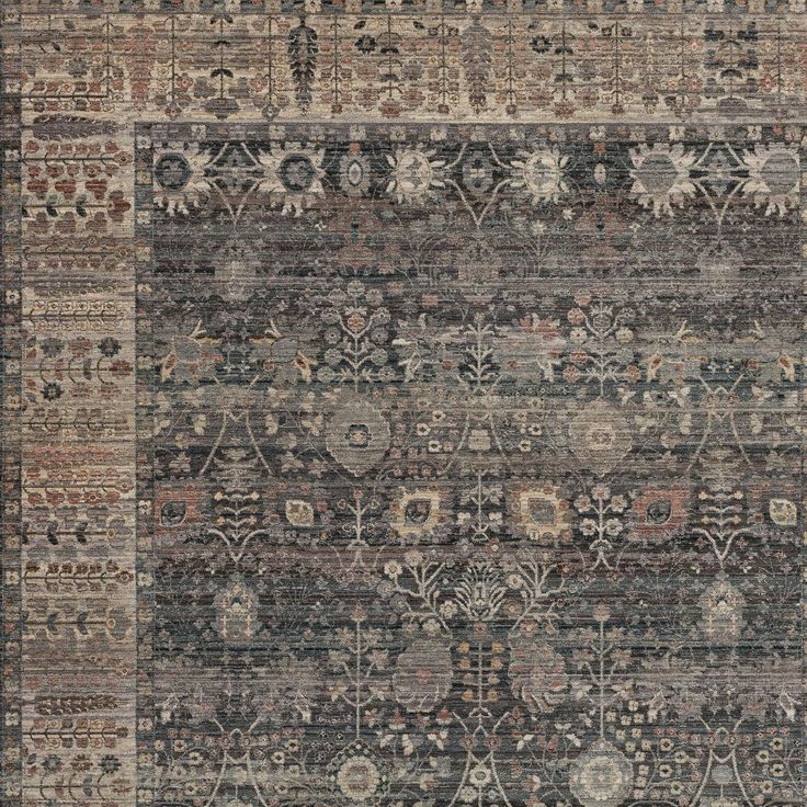 an area rug with various colors and patterns