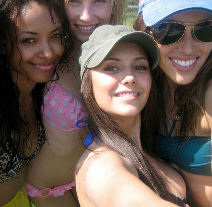 four young women taking a selfie together