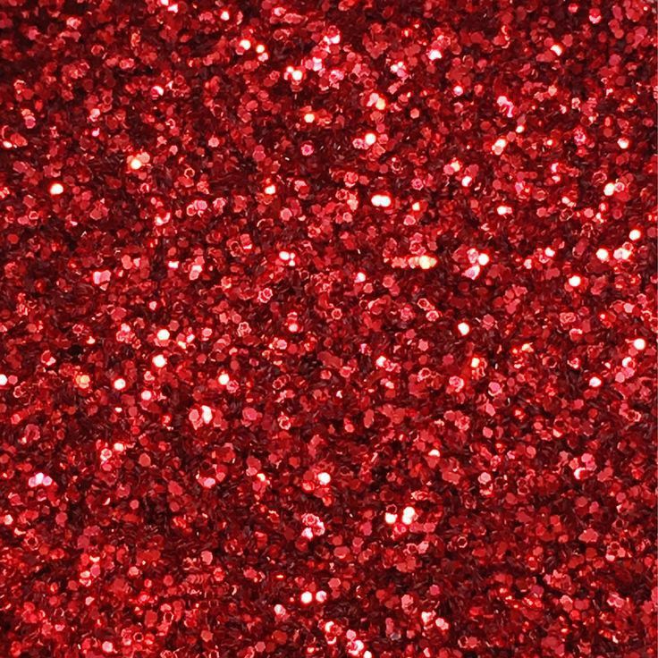 a red glitter background with lots of small dots