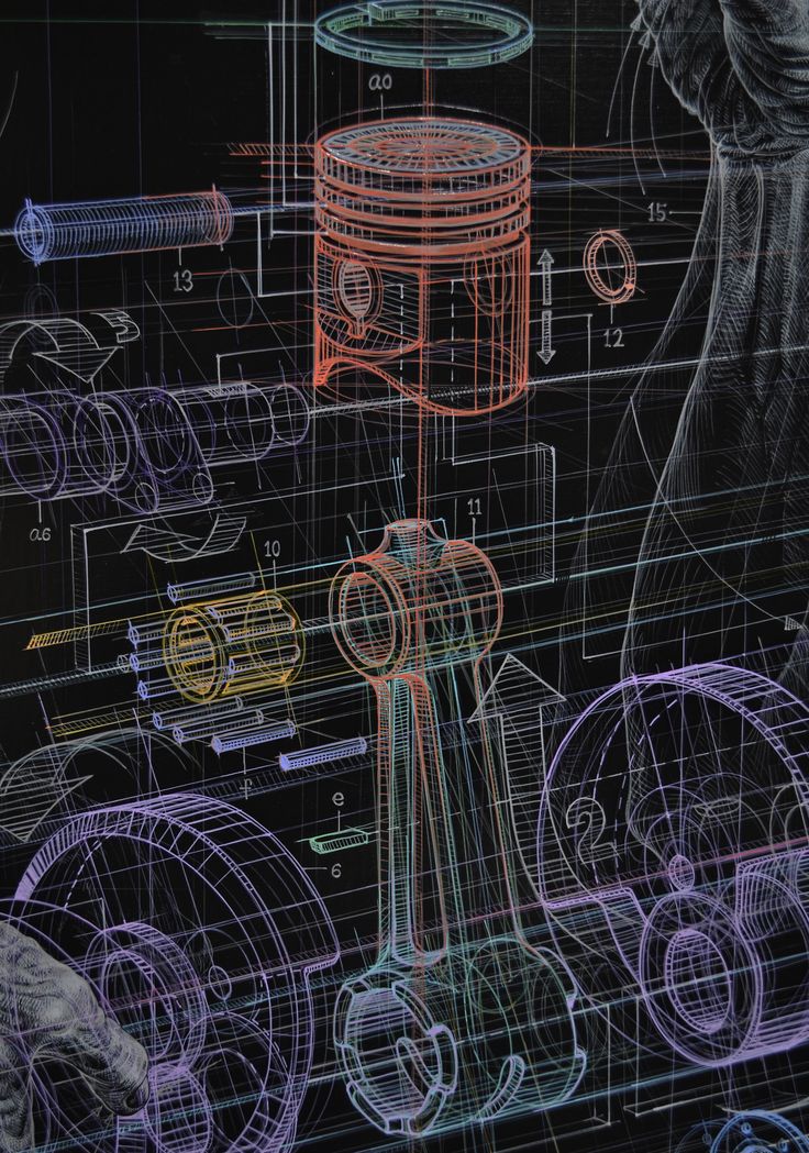 an image of a machine being built with blueprints and colored pencils on it