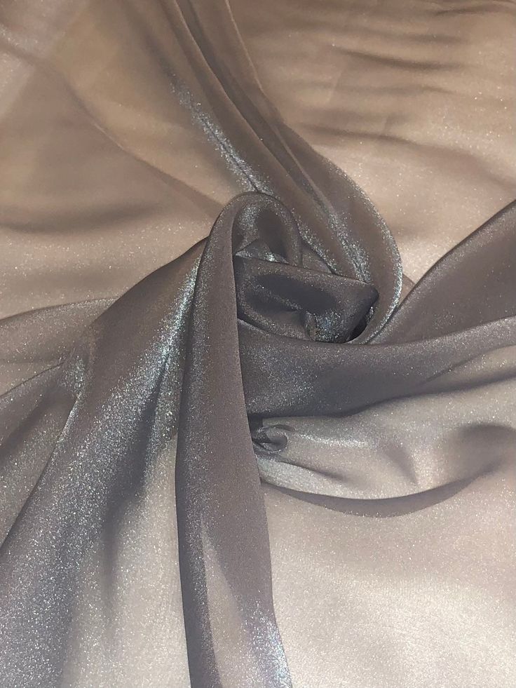 "Shiny organza fabric:- grey in colour  width is 45\" inches(112cm) shiny light weight smooth fabric  can be used for multiple projects dresses,crafts,face masks,scrubs,upholstery,bedding,children clothes,table tops ,curtains,cushions etc this price is for one meter and if you will buy more than one meter it will come as one continuous length  please note that we try our best to get the actual colour of the fabric but because of the camera effects and different monitoring screens colours may sli Shiny Organza Dress, Wide Dress, Camera Effects, Upholstery Bed, Bridal Decorations, Shiny Fabric, Organza Dress, Gray Silk, Metallic Fabric