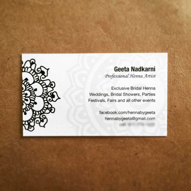 a business card with an intricate design on it