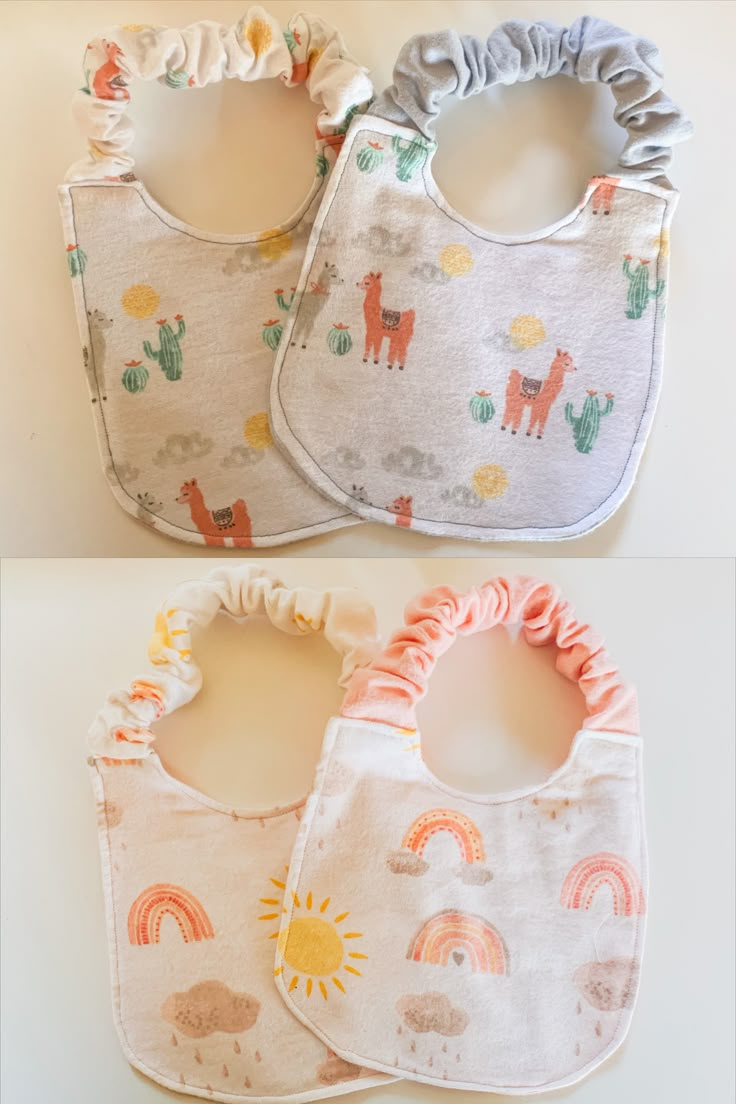 two bibs with different designs on them