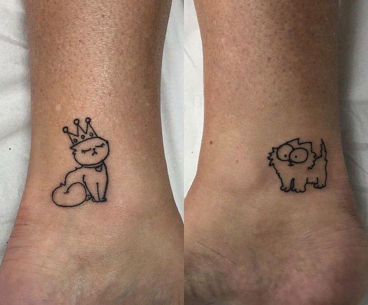 two people with matching tattoos on their feet, one has a dog and the other has a cat