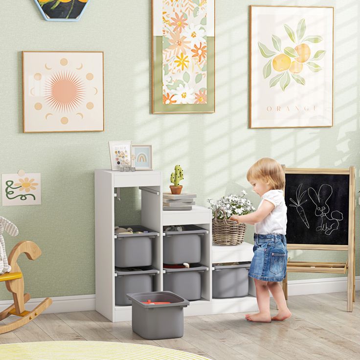 a young child playing with toys in a playroom