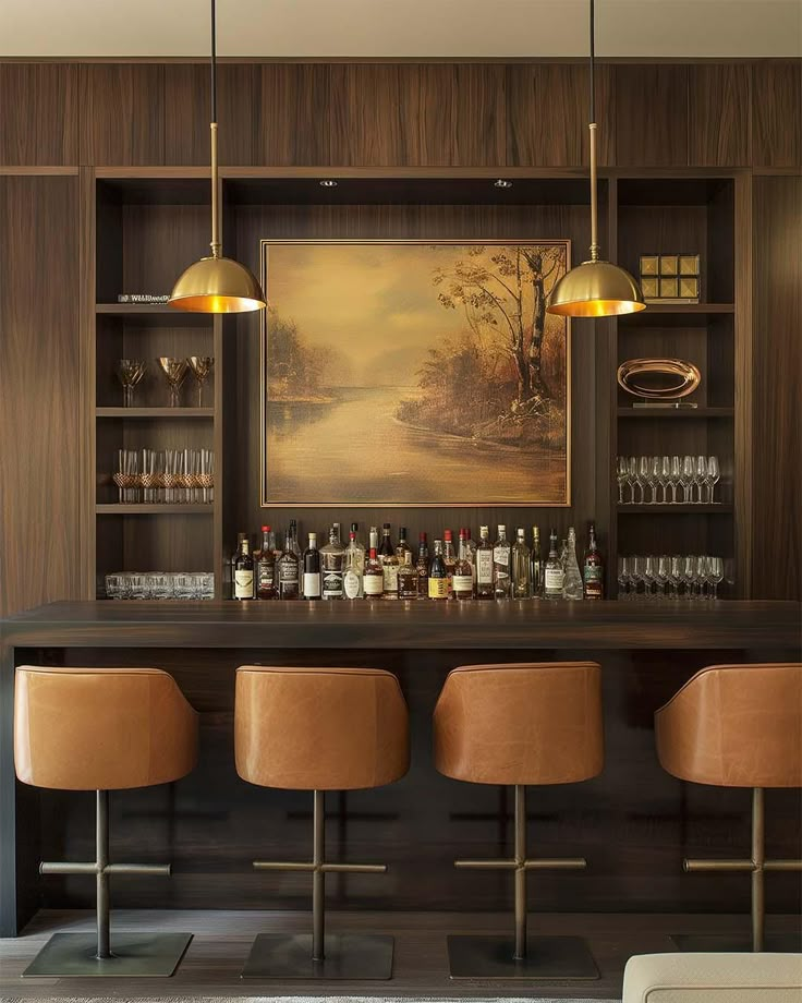 a bar with three stools in front of it and a painting on the wall