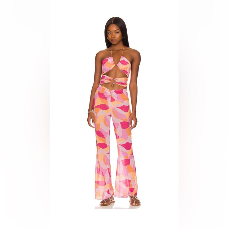 Pink And Orange Cut Out Jumpsuit From Lovers And Friends! Worn Once And In Perfect Condition Nwot Pink Printed Sleeveless Set, Pink Fitted Jumpsuits And Rompers, Flirty Pink Jumpsuits And Rompers For Vacation, Flirty Pink Jumpsuits And Rompers For Beach, Chic Pink Halter Neck Jumpsuit, Pink Halter Neck Jumpsuits And Rompers For Beach, Pink Halter Neck Jumpsuit For The Beach, Pink Halter Neck Jumpsuit For Beach, Pink Fitted Printed Jumpsuits And Rompers