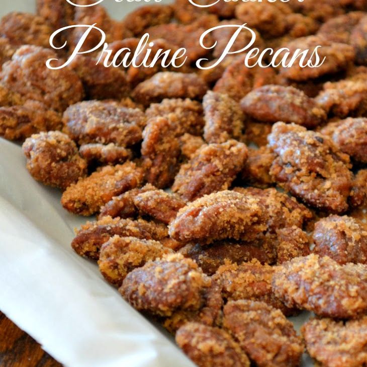 some kind of food sitting on top of a pan with the words praline pecans