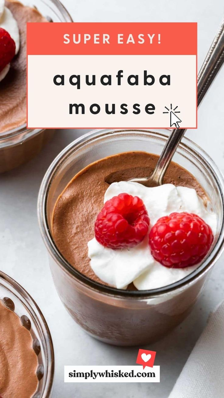 two desserts with chocolate pudding, whipped cream and raspberries in small bowls