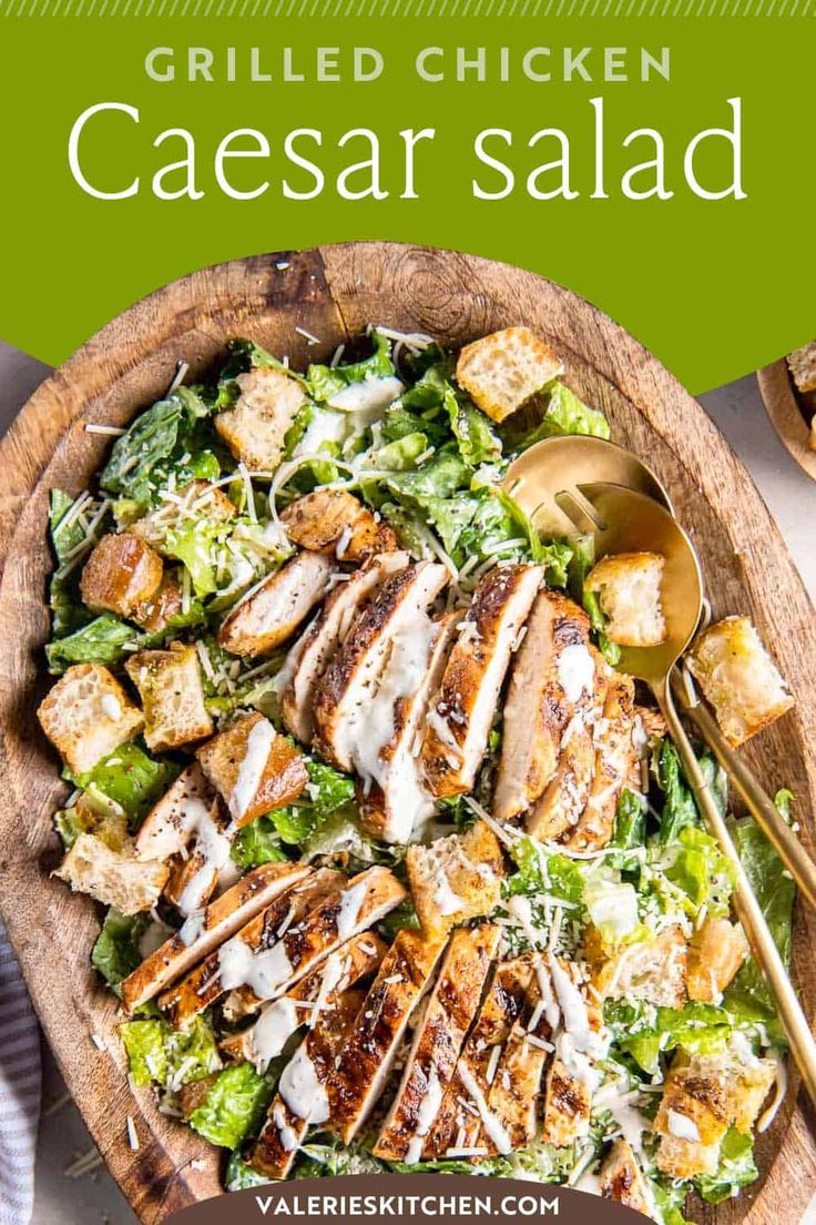 grilled chicken caesar salad on a wooden platter