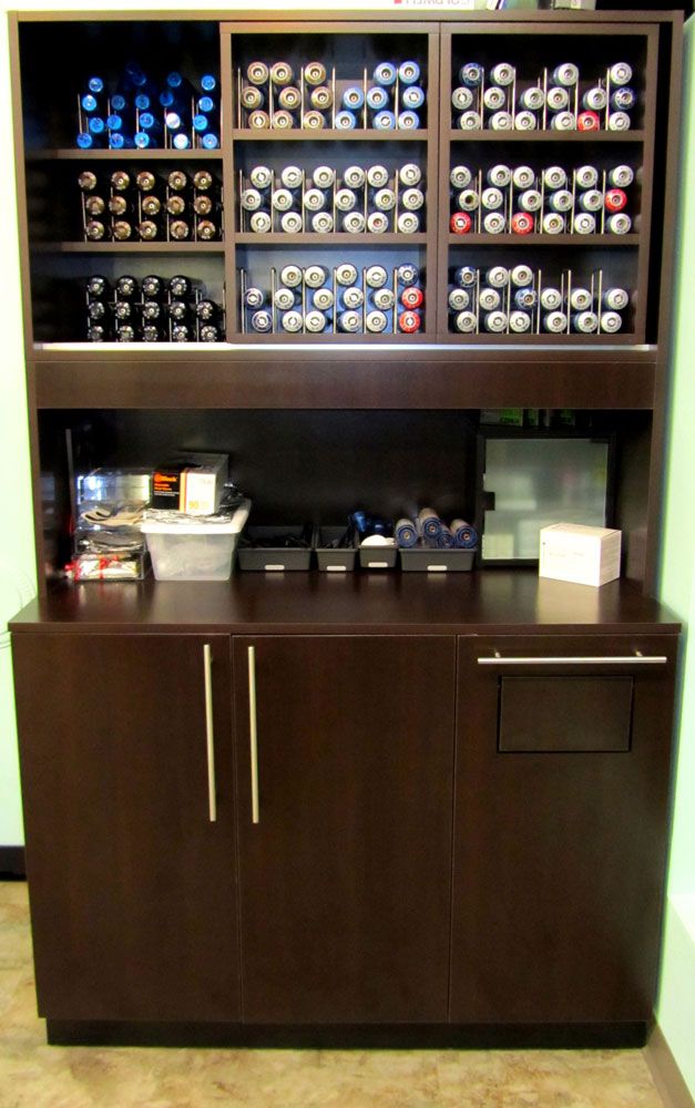 the coffee bar has many different types of beverages on it, including water and soda