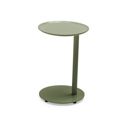 a round table with a metal base on an isolated white background for use as a side table