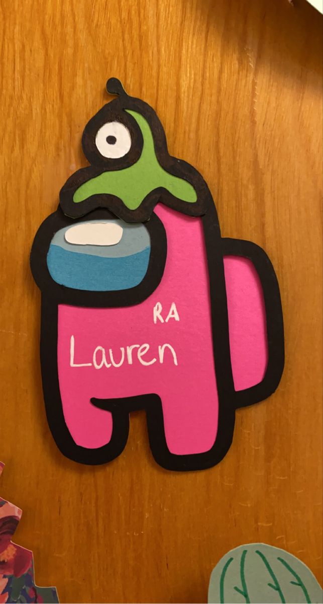 a wooden door with a sign that says lauren on it