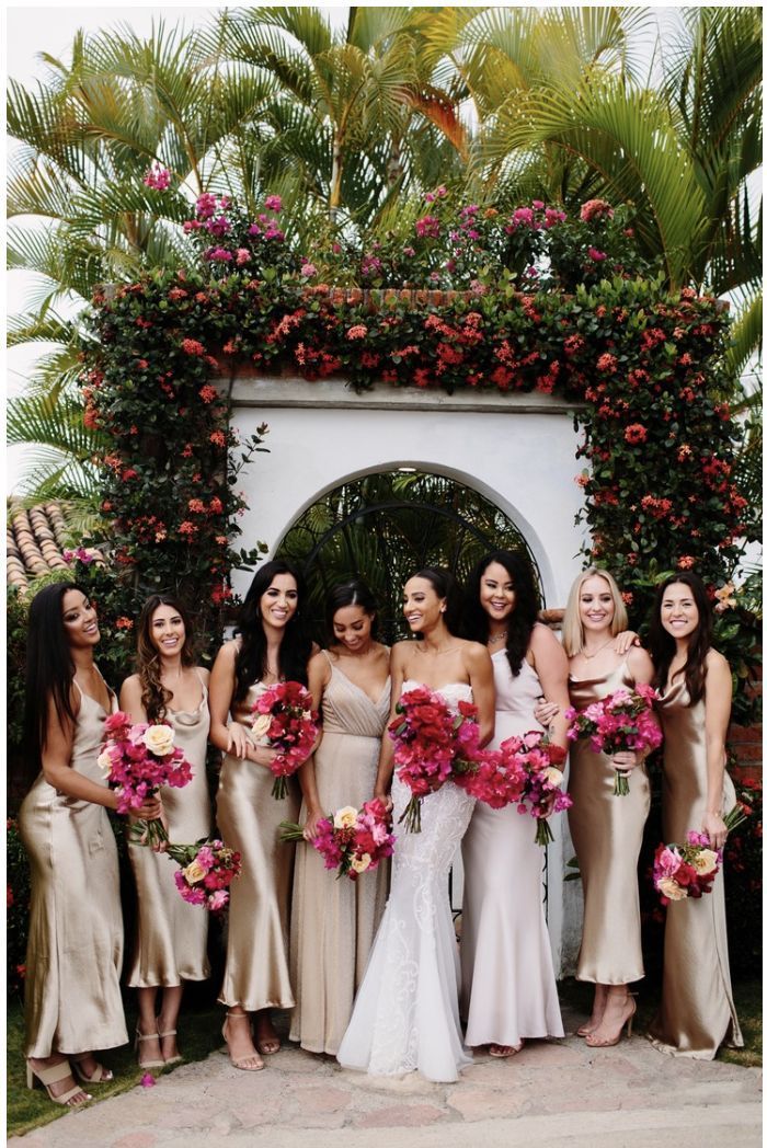 a group of women standing next to each other