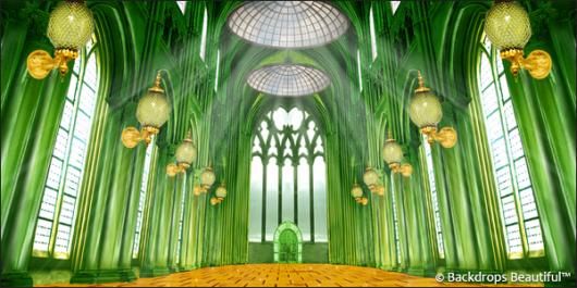 the interior of a cathedral with green walls and ceiling lights, large windows, and columns