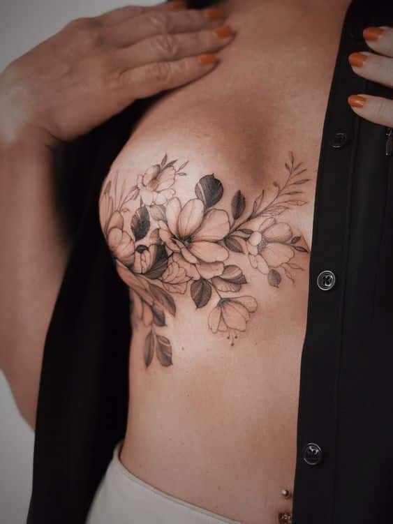 a woman's chest with flowers on it