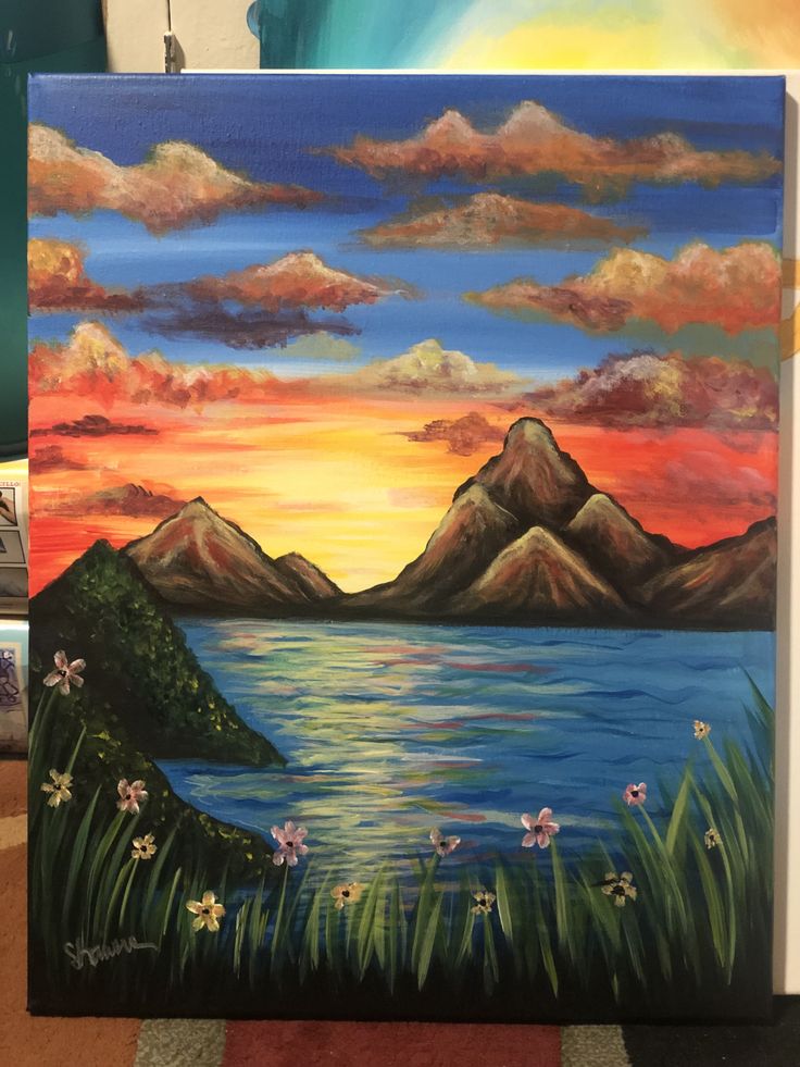 an acrylic painting of mountains and water at sunset