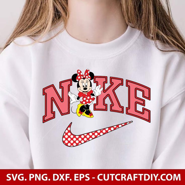 a girl wearing a minnie mouse shirt with the word nike on it's chest