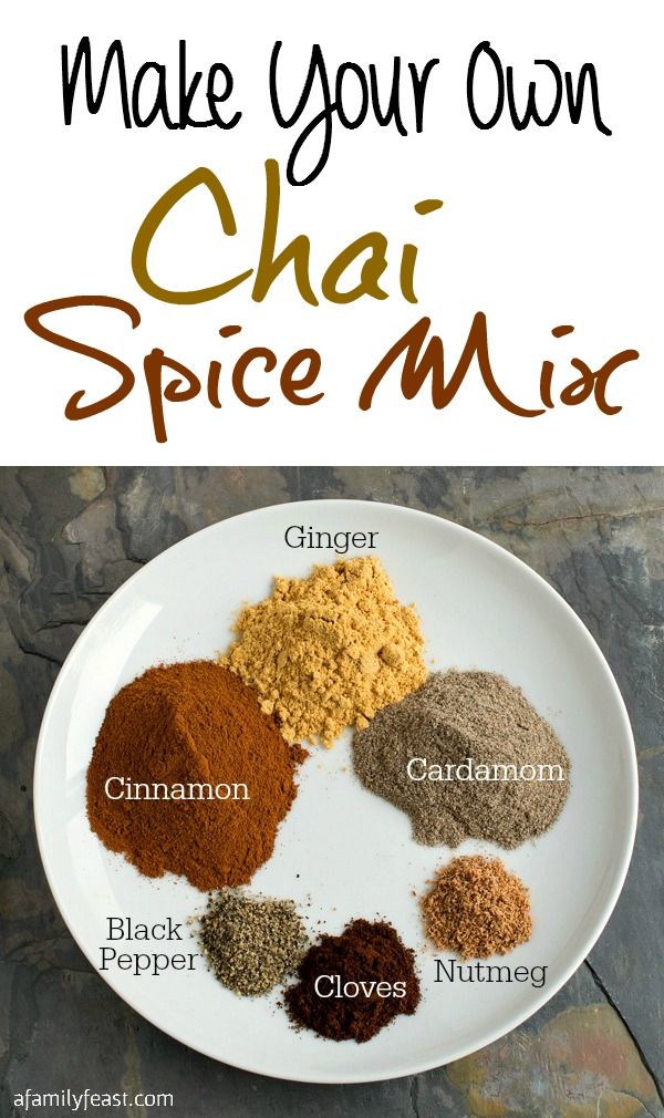 an image of spices on a plate with the words make your own chai spice mix