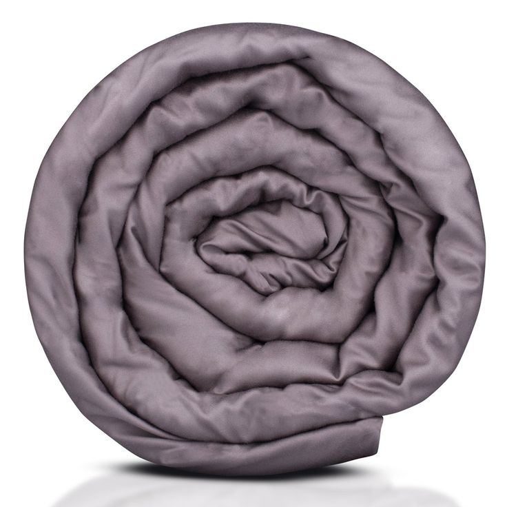 an image of a blanket that is folded in the shape of a spiral on a white background