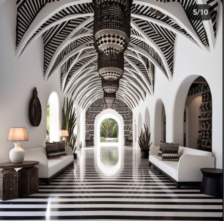 a large room with black and white striped flooring