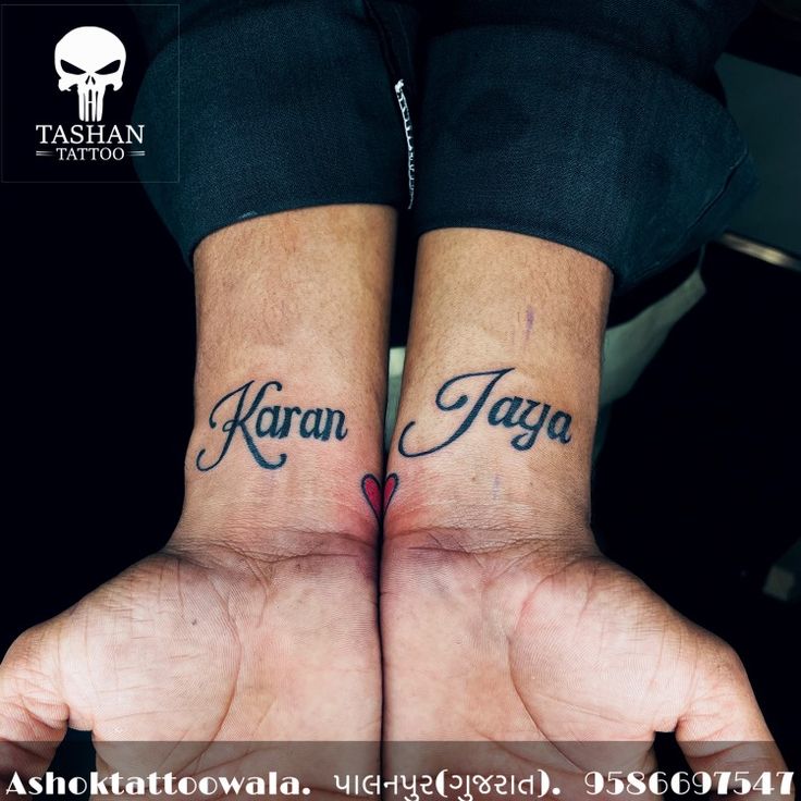 two people with matching tattoos on their hands, one has the words karan jagan and