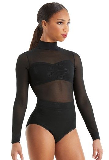 a woman wearing a black bodysuit with sheer mesh on the sides and long sleeves