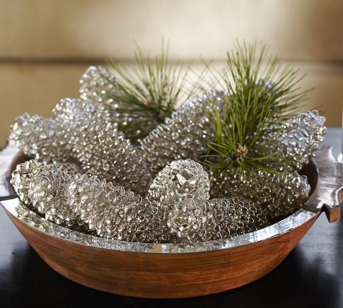 a potted plant sitting on top of a wooden table next to an email message