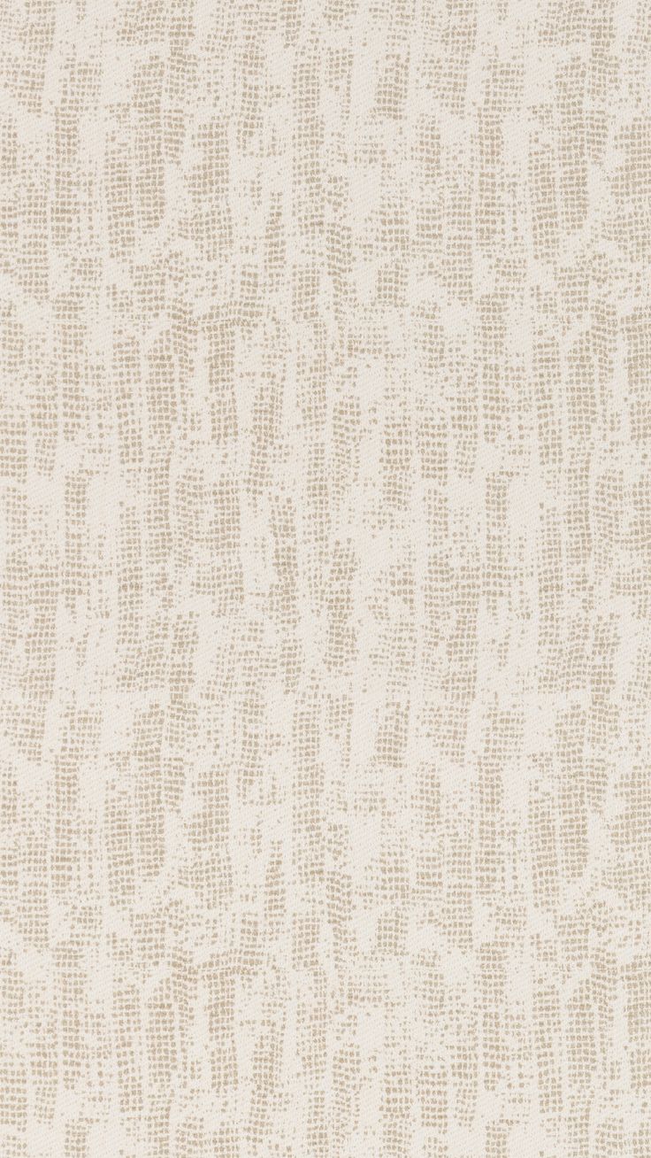 a beige and white wallpaper with small dots on it's surface, as well as an abstract pattern