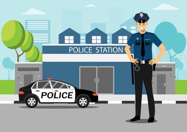 a police officer standing in front of a police station with his patrol car parked next to it