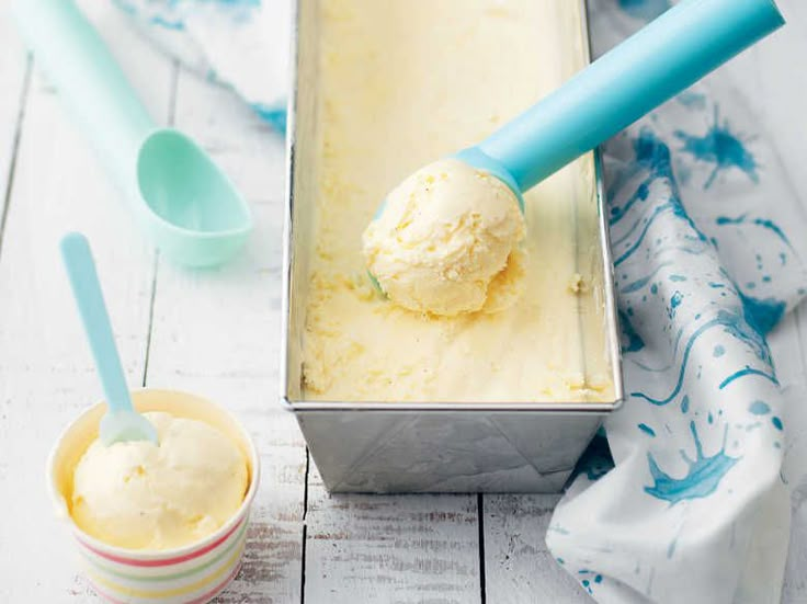 a scoop of ice cream sitting in a metal container