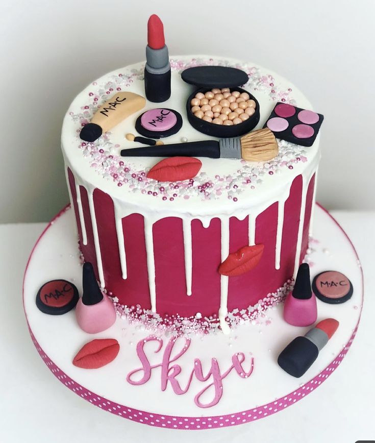 a birthday cake with makeup and lipstick on it