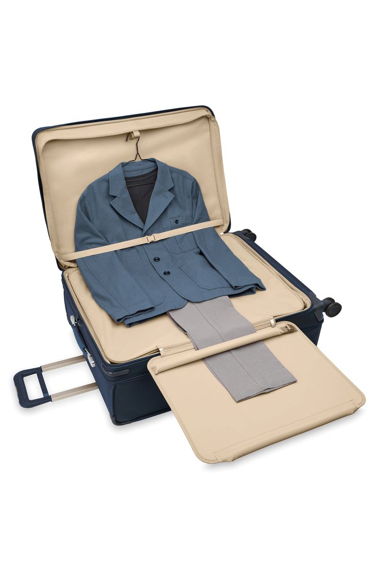 This extra-spacious suitcase designed for easy packing and easy transport features multiple compartments and pockets for all types of wardrobe items.Closure: The zip-around closure features self-repairing YKK zippers with lockable double pulls, and an included TSA cable combination lock keeps your possessions extra secure.Exterior features: The ballistic nylon exterior resists wear, moisture, dirt and abrasion, and proprietary shock-absorbing spinner wheels offer 360-degree movement and quiet gl Cheap Luggage With Sleeve For Overnight Trips, Cheap Casual Luggage With Zipper Closure, Cheap Functional Luggage, Cheap Large Capacity Travel Accessories For Everyday Use, Cheap Travel Accessories With Multiple Compartments For Everyday Use, Cheap Luggage For Overnight Trips With Multiple Compartments, Cheap Casual Travel Bag With Multiple Compartments, Cheap Functional Travel Luggage, Cheap Travel Cases With Luggage Sleeve