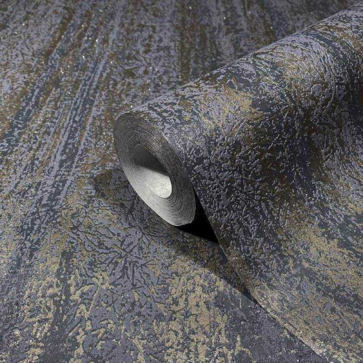 a roll of carpet that has been rolled up on top of the floor with a hole in it