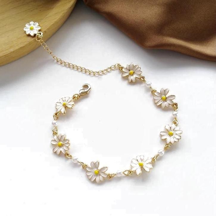 Size: 16-22 cm adjustable Material: alloy steel brass zinc Weight for 2: 0.2 oz Cheap Delicate Flower-shaped Jewelry, Cheap Flower-shaped Friendship Jewelry, Casual Cheap Flower Jewelry, Cheap White Flower Bracelets, Flowers Bracelets, Butterfly Charm Bracelet, Homeward Bound, Daisy Charm, Daisy Bracelet