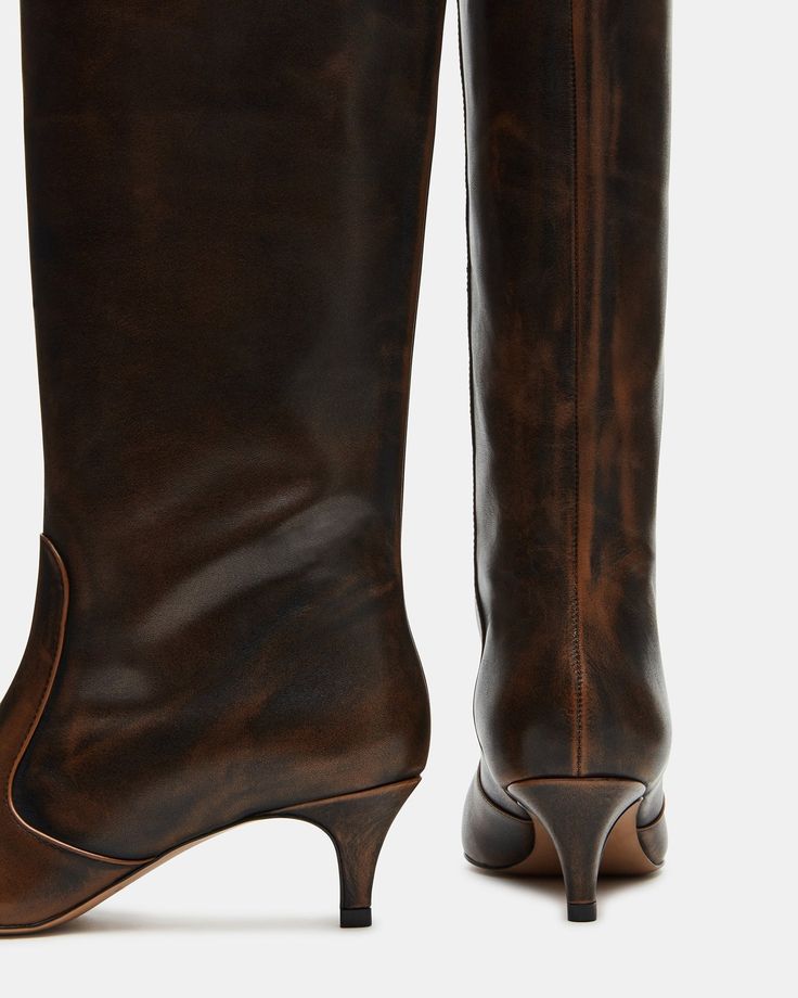 Upgrade your boot game with the LANDER boots. These boots have a square toe, knee-high length, and a trendy kitten heel and elevate any outfit while providing comfort and support. Perfect for everyday wear or dressing up for a night out. 2 inch heel height 14.75 inch shaft circumference 15.25 inch shaft height Leather upper material Textile and synthetic lining Synthetic sock Synthetic sole Imported Chic Mid-calf Heeled Boots Medium Width, Fitted Knee-high Boots With Sculpted Heel For Fall, Chic Wide Calf Mid-calf Heeled Boots, Chic Wide Calf Knee-length Boots, Fall Wide Calf Mid-calf Boots With Sculpted Heel, Wide Calf Mid-calf Boots With Sculpted Heel For Fall, Wide Calf Mid-calf Boots With Reinforced Heel, Mid-calf Heeled Boots With Reinforced Heel, Wide Calf Mid-calf Boots For Formal Occasions